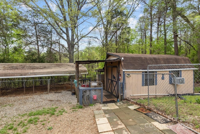335 Ridgewood Dr, Mount Ulla, NC 28125 - view of outbuilding featuring fence and an outdoor structure