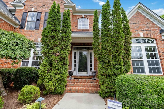 7302 Yellowhorn Trl, Waxhaw, NC 28173 - view of exterior entry featuring brick siding