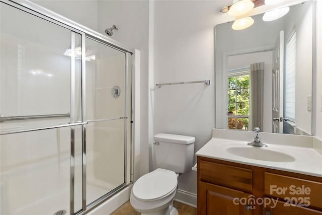 7302 Yellowhorn Trl, Waxhaw, NC 28173 - bathroom with vanity, toilet, and a shower stall