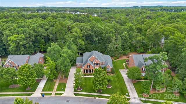 7302 Yellowhorn Trl, Waxhaw, NC 28173 - view of subject property with a heavily wooded area
