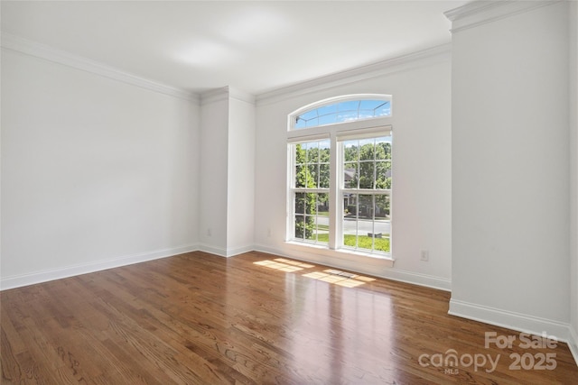 7302 Yellowhorn Trl, Waxhaw, NC 28173 - unfurnished room with wood finished floors and ornamental molding