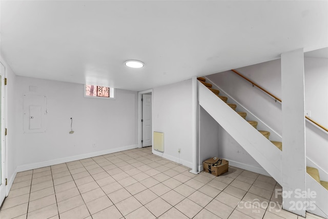 9 Canterbury Rd, Asheville, NC 28805 - basement with electric panel, stairs, light tile patterned floors, and baseboards