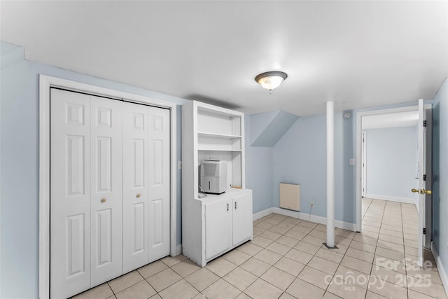 9 Canterbury Rd, Asheville, NC 28805 - bonus room with light tile patterned floors, baseboards, and built in shelves