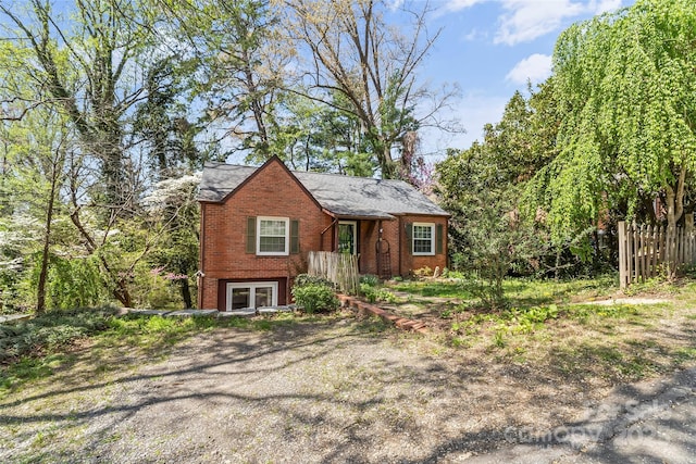 9 Canterbury Rd, Asheville, NC 28805 - view of front of house featuring brick siding and fence