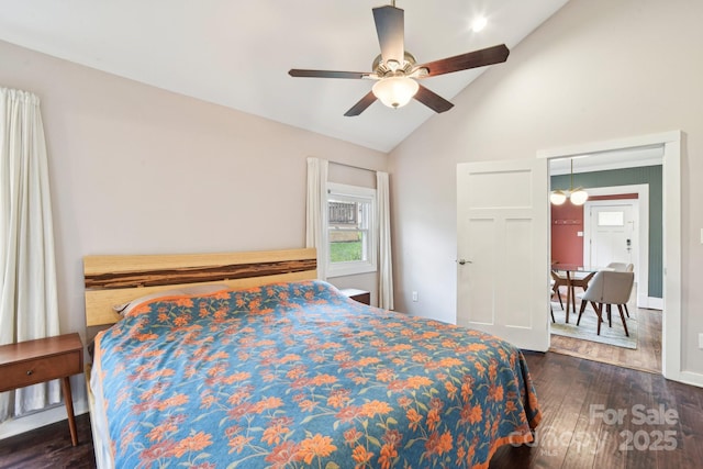 bedroom featuring high vaulted ceiling, wood finished floors, and a ceiling fan