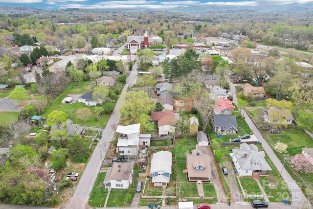 birds eye view of property with a residential view
