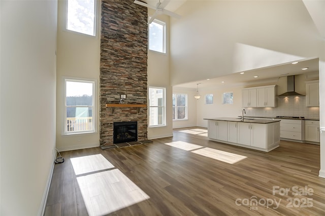 TBD Boomer Ct Unit 3, Statesville, NC 28677 - unfurnished living room with a high ceiling, wood finished floors, and a sink