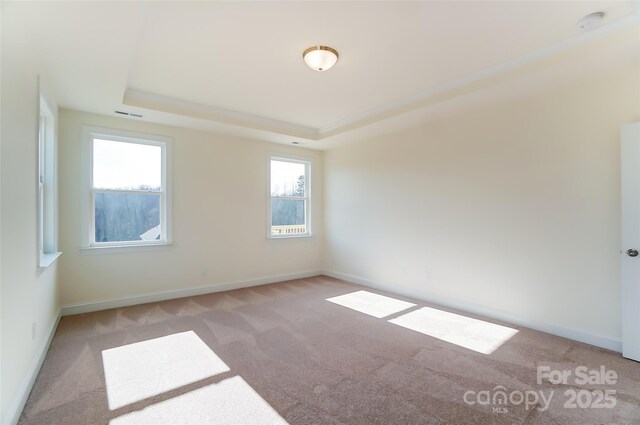 TBD Boomer Ct Unit 3, Statesville, NC 28677 - carpeted spare room with visible vents, baseboards, and a raised ceiling
