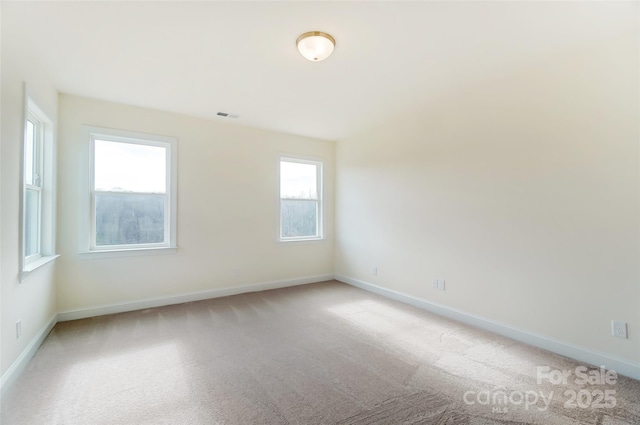 TBD Boomer Ct Unit 3, Statesville, NC 28677 - spare room featuring light carpet, baseboards, and visible vents