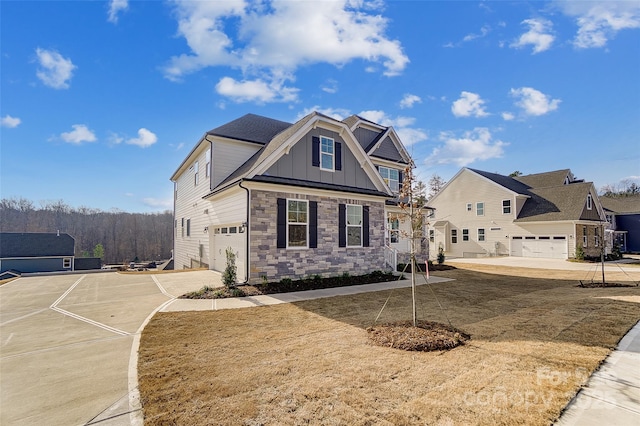TBD Boomer Ct Unit 3, Statesville, NC 28677 - craftsman-style home featuring concrete driveway, board and batten siding, stone siding, and an attached garage
