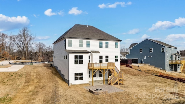 TBD Boomer Ct Unit 3, Statesville, NC 28677 - rear view of house featuring an outdoor fire pit, a shingled roof, a wooden deck, and stairs