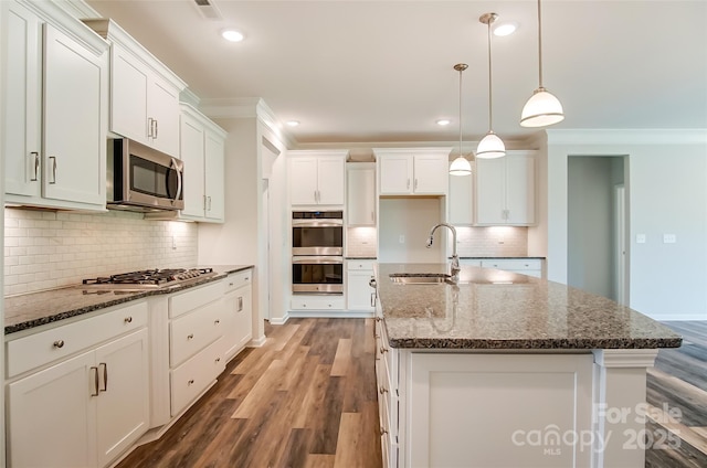 TBD Boomer Ct Unit 4, Statesville, NC 28677 - kitchen featuring light wood-style floors, ornamental molding, a sink, stainless steel appliances, and decorative backsplash