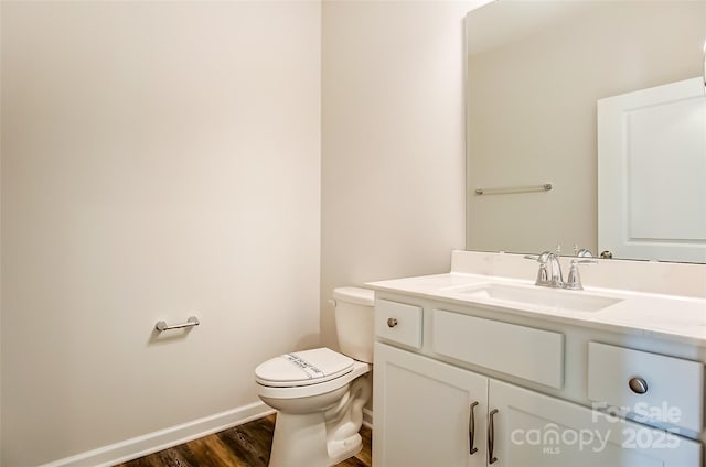 TBD Boomer Ct Unit 4, Statesville, NC 28677 - bathroom with toilet, wood finished floors, vanity, and baseboards