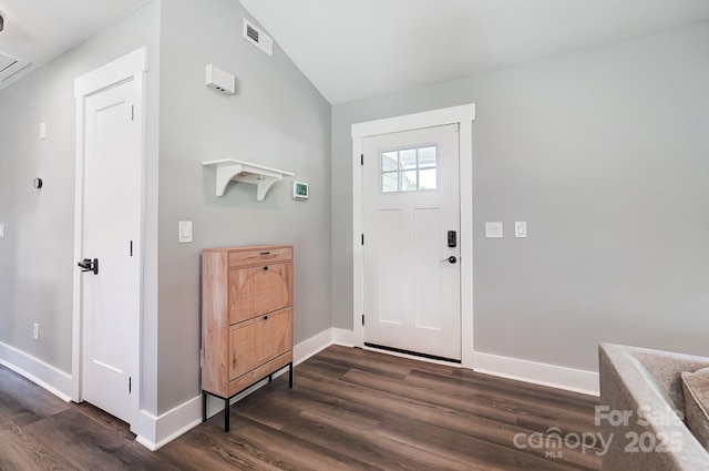 3612 Cobbleridge Dr, Charlotte, NC 28215 - foyer featuring dark wood-style floors, baseboards, and lofted ceiling