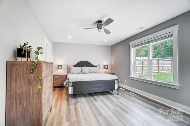 3612 Cobbleridge Dr, Charlotte, NC 28215 - bedroom featuring light wood-style floors, a ceiling fan, recessed lighting, and baseboards