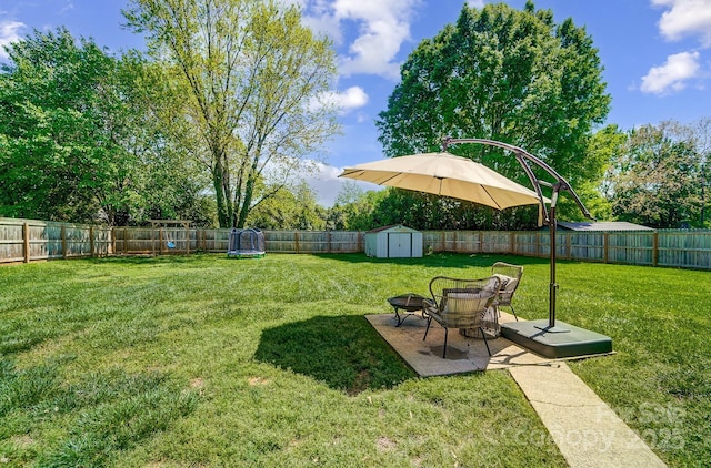 3612 Cobbleridge Dr, Charlotte, NC 28215 - view of yard featuring a storage shed, an outdoor structure, and a patio