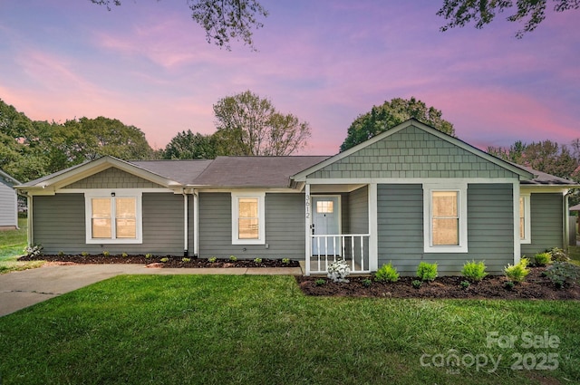 3612 Cobbleridge Dr, Charlotte, NC 28215 - ranch-style house with a lawn and covered porch