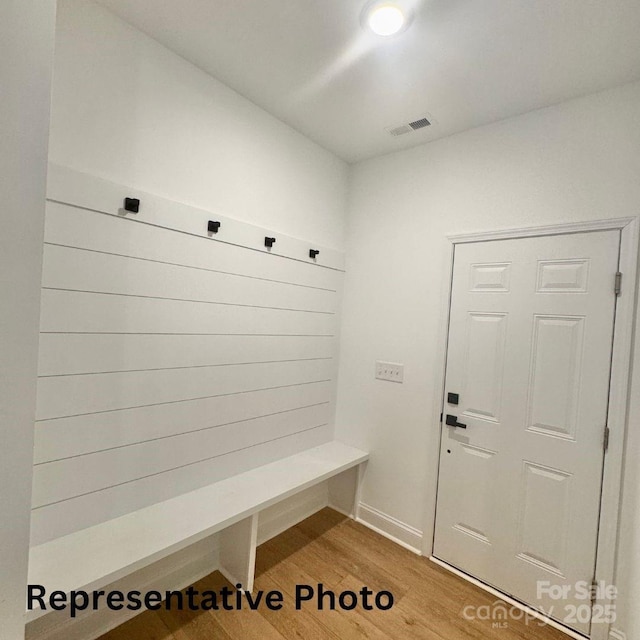 210 Carolina Drive 1000(&999), Troy, NC 27371 - mudroom featuring light wood-style floors and visible vents