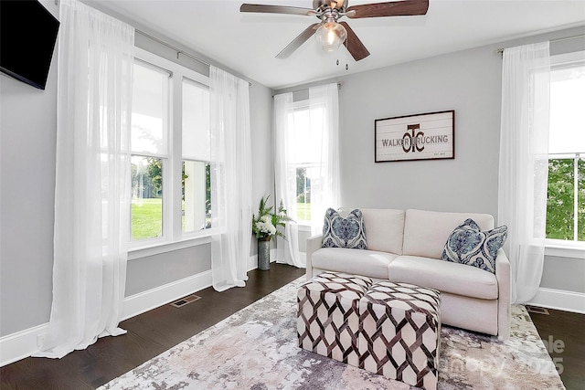 3915 Chevlot Hills Rd, Sherrills Ford, NC 28673 - living area with dark wood finished floors, a ceiling fan, and baseboards