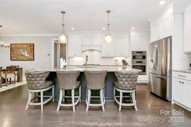 3915 Chevlot Hills Rd, Sherrills Ford, NC 28673 - kitchen with stainless steel appliances, a sink, white cabinets, decorative backsplash, and crown molding