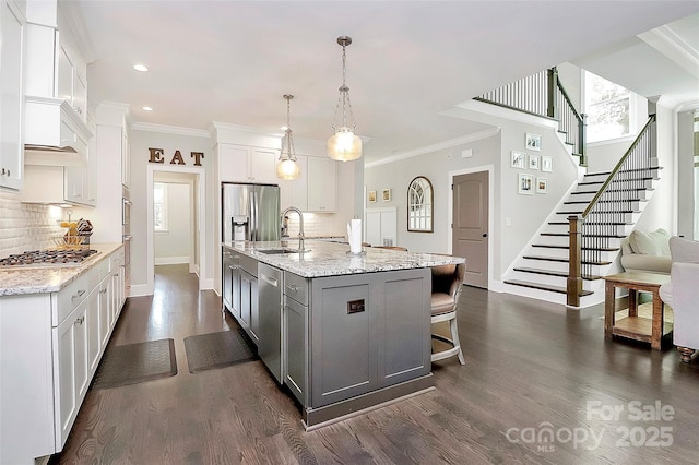 3915 Chevlot Hills Rd, Sherrills Ford, NC 28673 - kitchen with appliances with stainless steel finishes, a sink, gray cabinets, backsplash, and ornamental molding