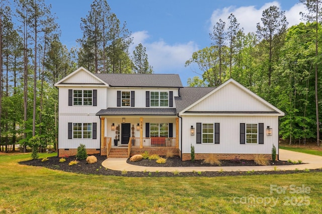 view of front of house with crawl space, covered porch, a shingled roof, and a front yard
