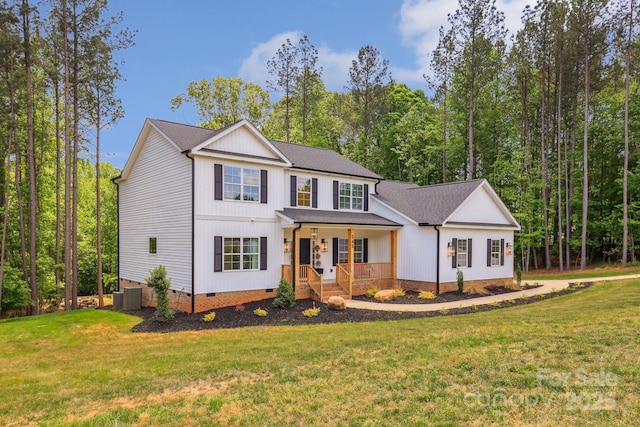 view of front of property featuring crawl space, a porch, and a front lawn