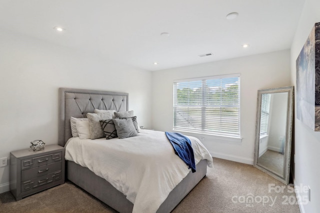 carpeted bedroom with baseboards and recessed lighting