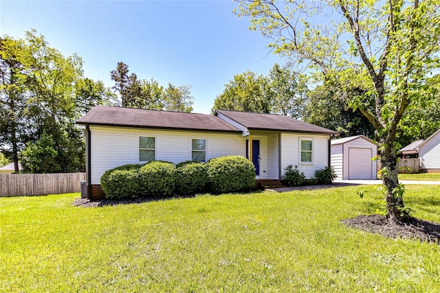 8210 Lantana Dr, Denver, NC 28037 - ranch-style home with an outbuilding, a front lawn, a detached garage, driveway, and fence
