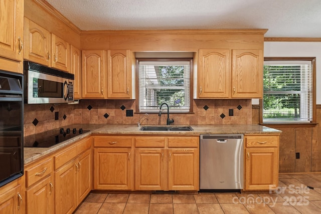 119 Legacy Ln, Harmony, NC 28634 - kitchen featuring stainless steel appliances, decorative backsplash, crown molding, a textured ceiling, and light tile patterned floors