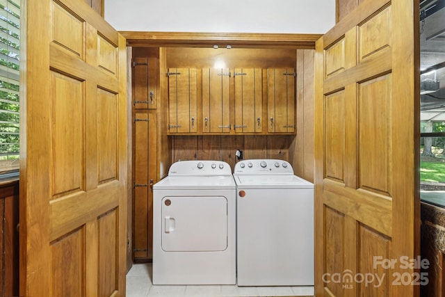 119 Legacy Ln, Harmony, NC 28634 - laundry area with cabinet space, separate washer and dryer, and light tile patterned floors