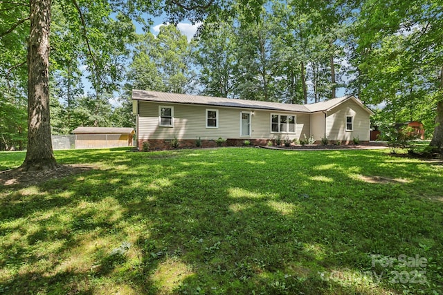 119 Legacy Ln, Harmony, NC 28634 - view of front of property featuring a metal roof and a front lawn
