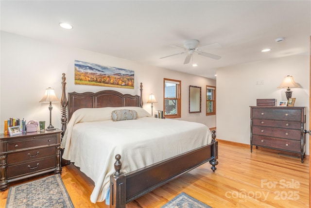 718 Lower Flat Creek Rd, Alexander, NC 28701 - bedroom with light wood finished floors, ceiling fan, recessed lighting, and baseboards