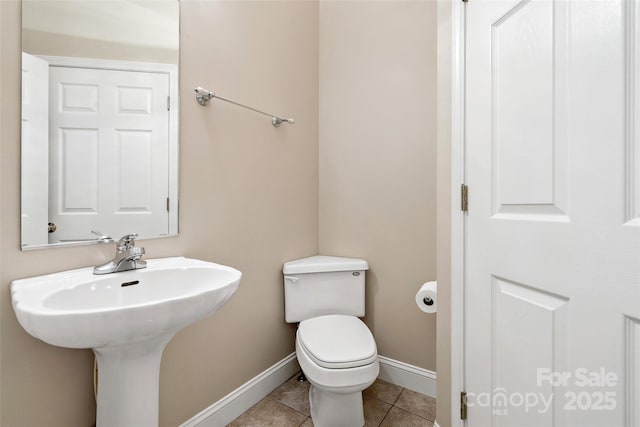 3 Teresa Way, Black Mountain, NC 28711 - bathroom featuring toilet, baseboards, tile patterned flooring, and a sink