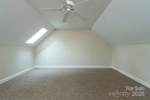 3 Teresa Way, Black Mountain, NC 28711 - additional living space featuring carpet flooring, vaulted ceiling, baseboards, a skylight, and a ceiling fan
