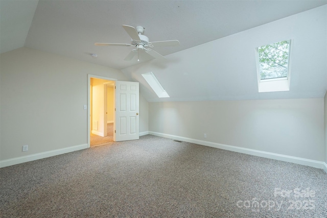 3 Teresa Way, Black Mountain, NC 28711 - bonus room featuring a skylight, lofted ceiling, baseboards, ceiling fan, and carpet floors