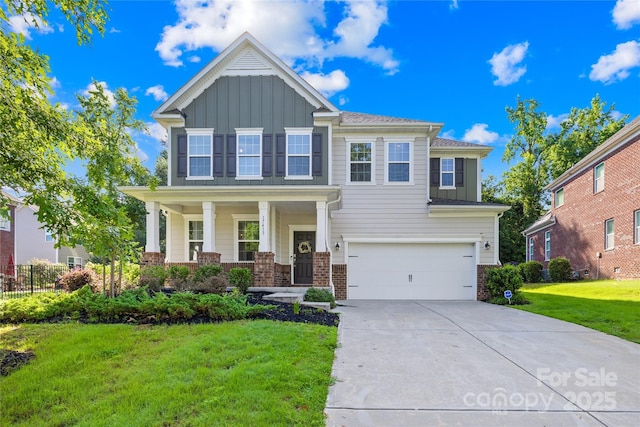 17413 Caddy Ct, Charlotte, NC 28278 - craftsman-style home with board and batten siding, an attached garage, brick siding, concrete driveway, and a front yard