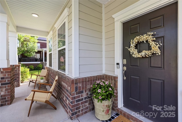 17413 Caddy Ct, Charlotte, NC 28278 - property entrance with a porch