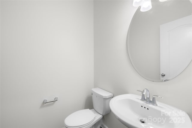 17413 Caddy Ct, Charlotte, NC 28278 - half bath with a sink and toilet