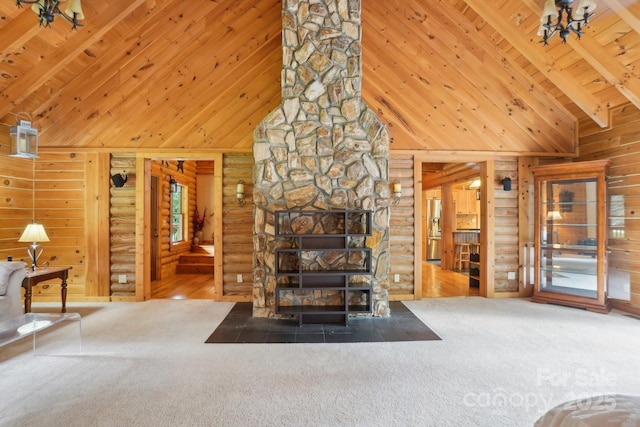 10583 Earnhardt Lake Rd, Davidson, NC 28036 - unfurnished living room featuring wooden ceiling with exposed beams, carpet floors, high vaulted ceiling, log walls, and wooden walls