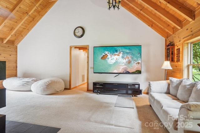 10583 Earnhardt Lake Rd, Davidson, NC 28036 - carpeted living room featuring wood ceiling with exposed beams, high vaulted ceiling, and baseboards
