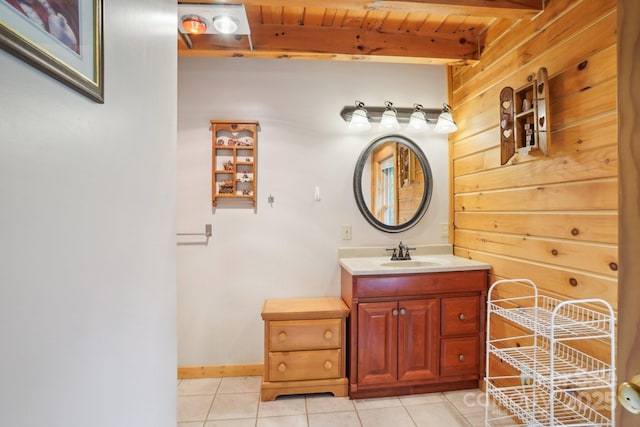 10583 Earnhardt Lake Rd, Davidson, NC 28036 - bathroom with tile patterned floors, beamed ceiling, vanity, and baseboards
