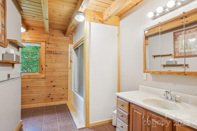 10583 Earnhardt Lake Rd, Davidson, NC 28036 - full bath featuring wood ceiling with exposed beams, vanity, toilet, tile patterned floors, and baseboards