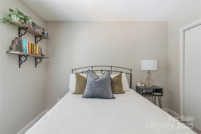 bedroom with baseboards