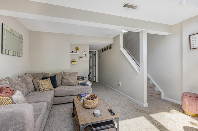 7324 Pebblestone Dr Unit E, Charlotte, NC 28212 - living area featuring baseboards, carpet, visible vents, and stairway