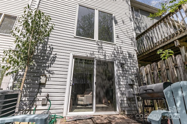 7324 Pebblestone Dr Unit E, Charlotte, NC 28212 - back of property with fence and cooling unit