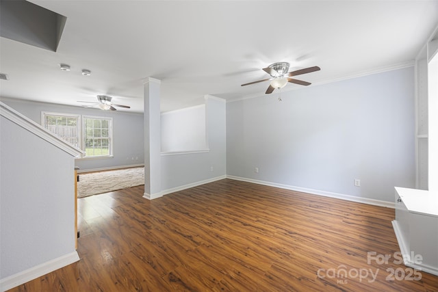4219 Shasta Cir, Clover, SC 29710 - unfurnished living room featuring ceiling fan, wood finished floors, baseboards, and ornamental molding