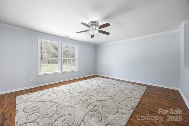 4219 Shasta Cir, Clover, SC 29710 - spare room with a ceiling fan, baseboards, ornamental molding, and wood finished floors