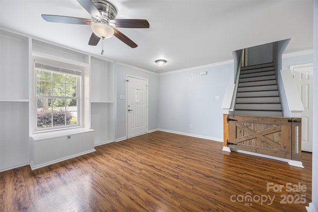 4219 Shasta Cir, Clover, SC 29710 - unfurnished living room featuring ornamental molding, a ceiling fan, wood finished floors, baseboards, and stairway