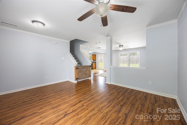 4219 Shasta Cir, Clover, SC 29710 - unfurnished living room featuring a ceiling fan, stairway, wood finished floors, baseboards, and ornamental molding